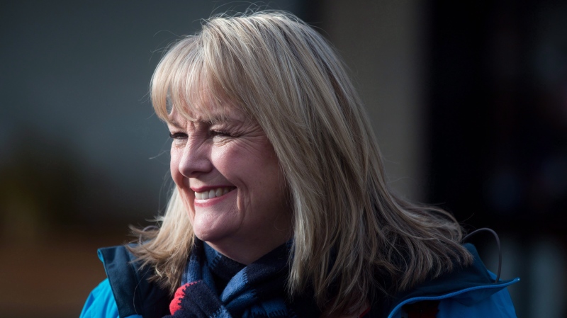 South Surrey-White Rock Conservative byelection candidate Kerry-Lynne Findlay smiles while campaigning with then-Conservative Leader Andrew Scheer, not shown, in Surrey, B.C., Monday, Dec. 4, 2017. Findlay, a Conservative MP, is apologizing for "thoughtlessly" retweeting an anti-Semitic post by a conspiracy theorist in an attempt to criticize Finance Minister Chrystia Freeland. (THE CANADIAN PRESS/Darryl Dyck)