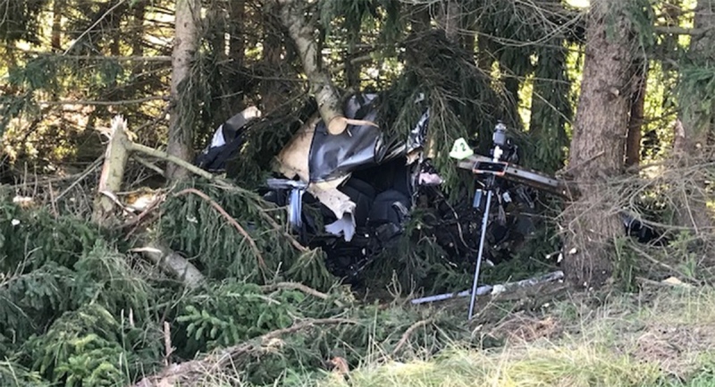 A vehicle rests among the trees after what police call a 'catastrophic' fatal crash north of London, Ont. on Monday, Aug. 31, 2020. (Sean Irvine / CTV News)