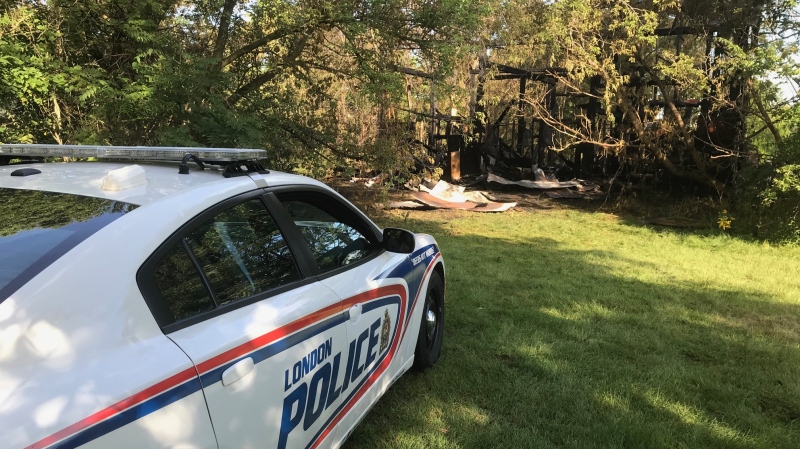 A London Police Service cruiser guards the scene the morning after a suspicious fire in London, Ont., Thursday, Sept. 3, 2020. (Sean Irvine / CTV News) 