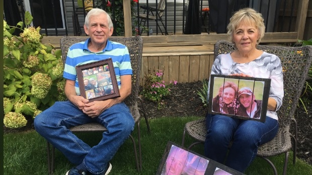 Gerry and Jana Male hold a photo of their son Gerald Robert Male, who died April 5, 2019 after being shot (Natalie van Rooy / CTV News Kitchener)