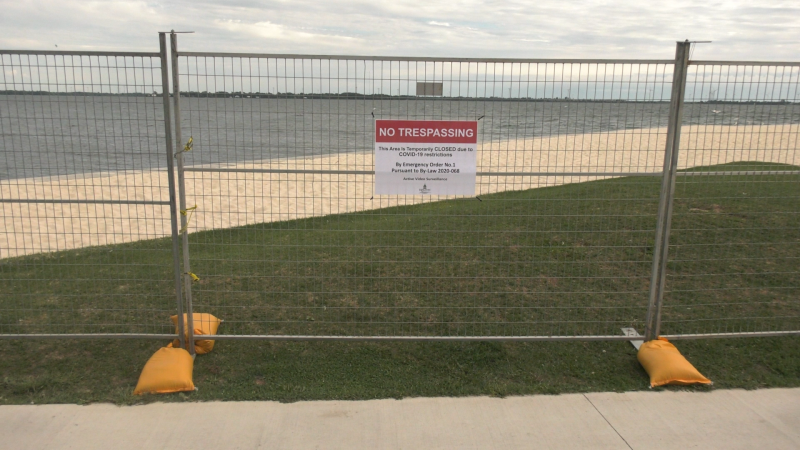 A no trespassing sign at the beach at Kingston's Breakwater Park. Sept, 2020. (Kimberley Johnson / CTV News Ottawa)