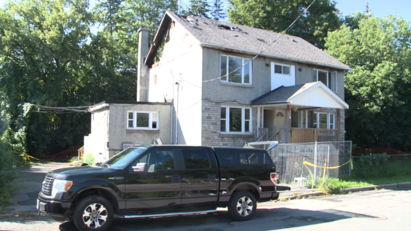 Fire investigators are looking in to how a fire started in the basement of 256 St. Denis St. early Sunday, Sept. 6, 2020. The home had been damaged by fire in July. (Mike Mersereau / CTV News Ottawa)