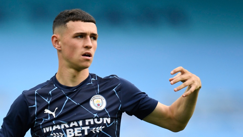 Phil Foden warms up