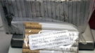 Confiscated cigarettes are shown at the Royal Canadian Mounted Police office in Cornwall, Ont., Wednesday, Nov. 14, 2007. (AP Photo/Mike Groll)