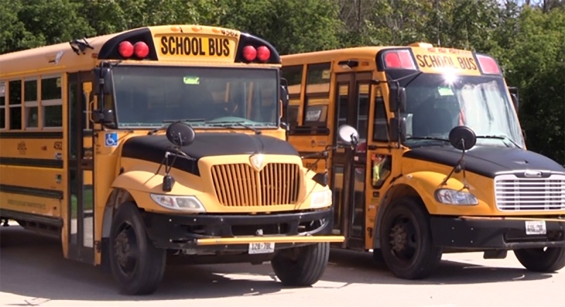 School buses are parked in Wingham, Ont. on Friday, Sept. 11, 2020. (Scott Miller / CTV News)
