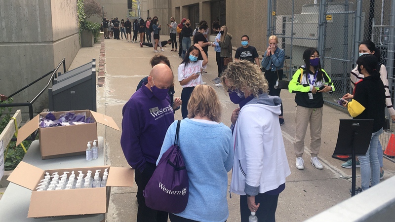 Students line up to get tested at the COVID-19 Assessment Centre at Western University in London, Ont. on Monday, Sept. 14, 2020. (Brent Lale / CTV News)