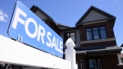 A new home is displayed for sale in a new housing development in Ottawa on Tuesday, July 14, 2020. THE CANADIAN PRESS/Sean Kilpatrick