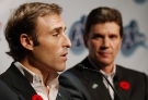 Toronto Argonauts co-owner David Cynamon, left, speaks as co-owner Howard Sokolowski looks on in Toronto Wednesday Nov. 5, 2003. (CP PHOTO/Aaron Harris)