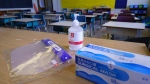 Personal protection equipment is seen on the teacher's desk in classroom in preparation for the new school year at the Willingdon Elementary School in Montreal, on Wednesday, August 26, 2020. THE CANADIAN PRESS/Paul Chiasson