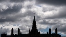Clouds pass by the parliament builidings Wednesday August 19, 2020 in Ottawa. Parliament will resume Sept. 23 with a Speech from the Throne after it was prorogued Tuesday. THE CANADIAN PRESS/Adrian Wyld

