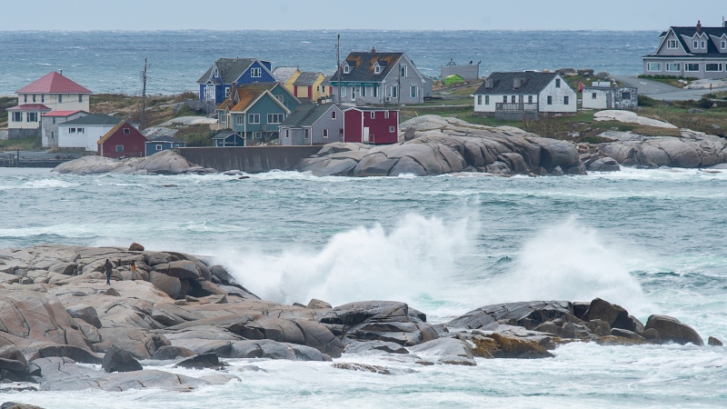 Waves batter the shore in Peggy's Cove, N.S., on Wednesday, Sept. 23, 2020. Hurricane Teddy impacted the Atlantic region as a post-tropical storm, bringing rain, wind and high waves. (THE CANADIAN PRESS/Andrew Vaughan)