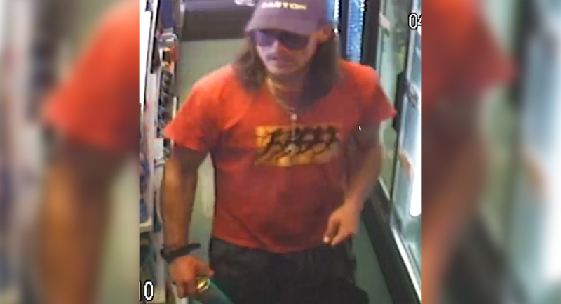 A suspect sought in a gas bar robbery in London, Ont. on Friday, Sept. 4, 2020 is seen in this image released by the London Police Service.