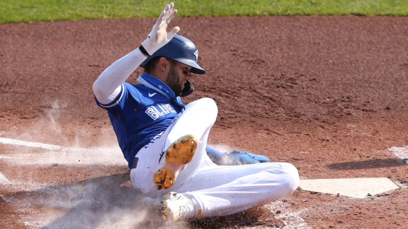 Toronto Blue Jays' Lourdes Gurriel Jr. scores on a sacrifice fly by Jonathan Davis during the second inning of a baseball game against the Baltimore Orioles, Sunday, Sept. 27, 2020, in Buffalo, N.Y. (AP Photo/Jeffrey T. Barnes)