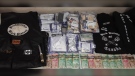 Cape Breton Regional Police seized drugs, cash and clothing while searching properties in connection with an investigation into organized crime allegedly involving two outlaw motorcycle gangs in Glace Bay, N.S., on Sept. 25, 2020. (Cape Breton Regional Police)