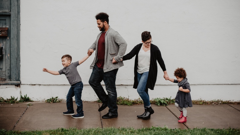 An undated file photo of parents and their children. (Photo by Emma Bauso from Pexels)