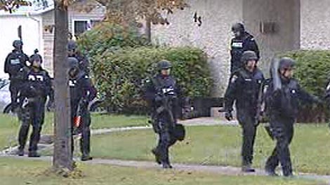 Heavily-armed officers raided several homes Friday morning. 