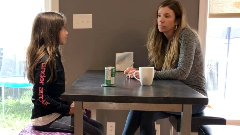 Heather Larmer and her daughter waiting for COVID-19 test results so she can return to school. (Dave Charbonneau/CTV News Ottawa)