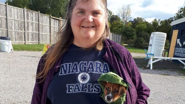 Angela Clunas with her 9-week-old Jack Puggle, Rylie (dressed as a dragon) attended the Super Market on Saturday, October 3, 2020 (Source: Angela Clunas)