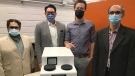 Western University’s new portable temperature regulating device is seen with member of its research and development team. From right is Tamer Mohamed, Dr. Alp Sener, Steven Jevnikar & Kamran Siddiqui. (Sean Irvine CTV News)