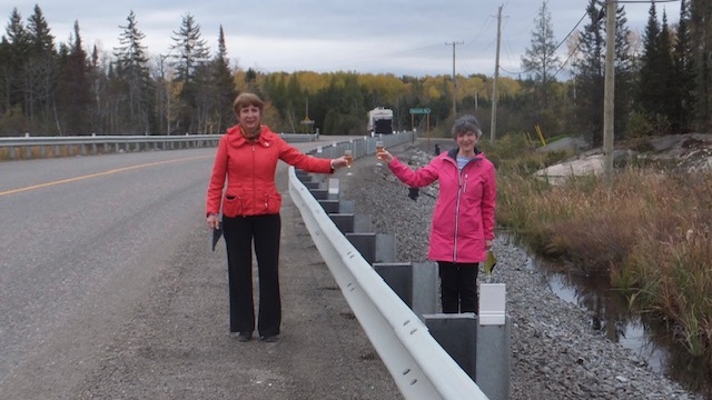 Deb McIntosh and France Gelinas toast to Hwy 537 