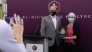 Drew Dilkens, the mayor of Windsor, presents a plaque to Janice Kaffer, the president and CEO of Hotel-Dieu Grace Healthcare, to thank healthcare workers at the hospital for their work during the COVID-19 pandemic on Thursday, October 8, 2020. (Ricardo Veneza/CTV Windsor)