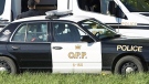 An OPP forensic unit gathers evidence at a scene of interest as police investigate the disappearance of eight year-old Victoria 'Tori' Stafford near Fergus, Ont., on Thursday, May 21, 2009. (Nathan Denette / THE CANADIAN PRESS)