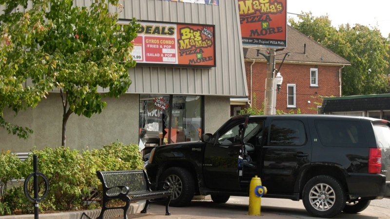 After losing control of his vehicle a driver collides with Big Mama Pizzeria in Windsor, Ont. on Saturday, Oct. 10 2020. (Ricardo Veneza/CTV Windsor)