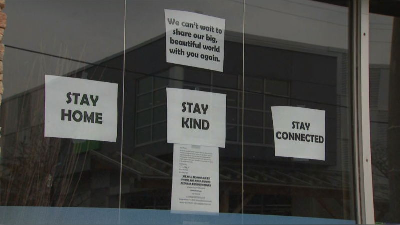 Signs in the window of an Ottawa business that is closed due to COVID-19. (CTV News Ottawa)