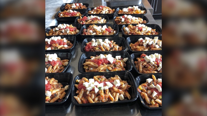 The Parkdale Food Centre's "Cooking for a Cause" program pays restaurants to cook meals which are then delivered by social service agencies across Ottawa. (Photo credit: Jeff Radbourne, courtesy of Karen Secord, Parkdale Food Centre)