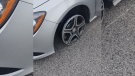 OPP pulled over this vehicle on Highway 401 after it was reported to be driving on a rim. (OPP Twitter) 