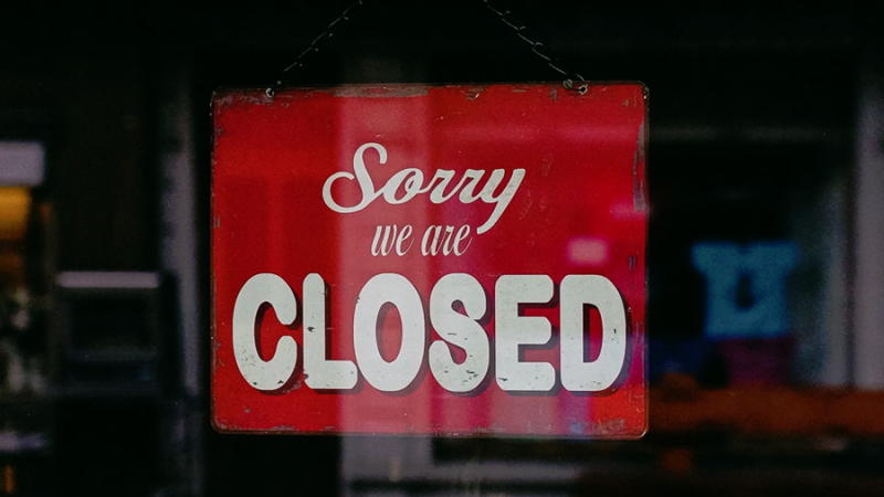 This file photo shows a closed sign on a business. 