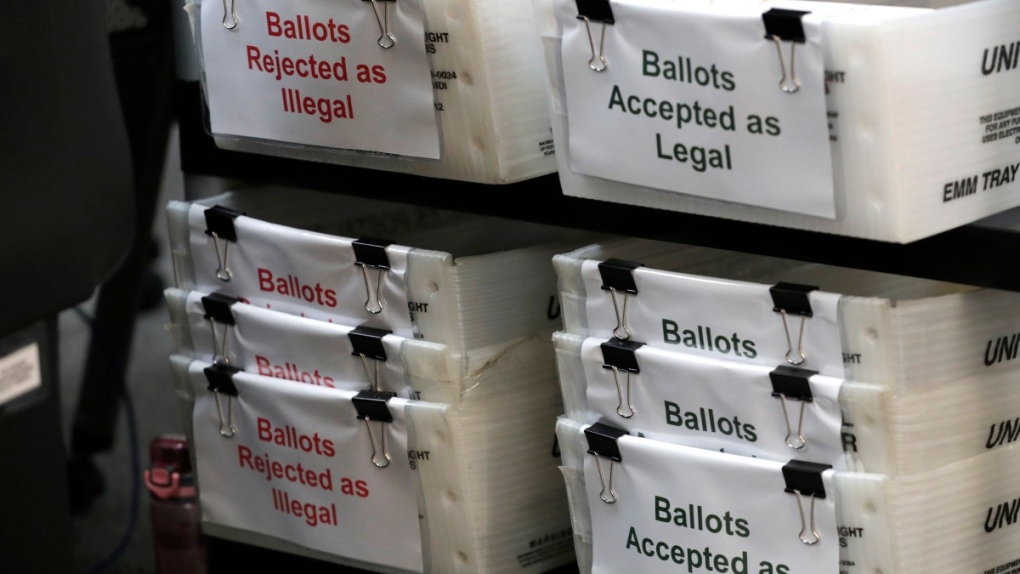 Boxes for illegal and legal vote-by-mail ballots