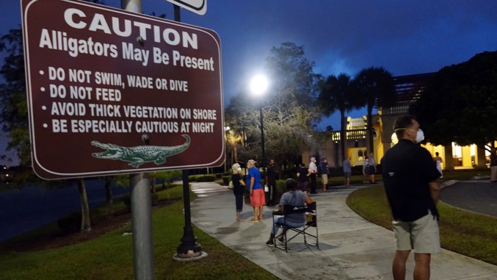 Florida voters wait in the dark