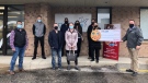 Tim Hortons owner present a cheque for over $250,000 from the Smile cookie campaign to the Children's Health Foundation in London, Ont. on Monday, Oct. 19, 2020. (Jordyn Read / CTV News)