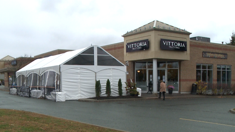 The patio and tent at Vittoria Trattoria restaurant on Rivergate Way. 