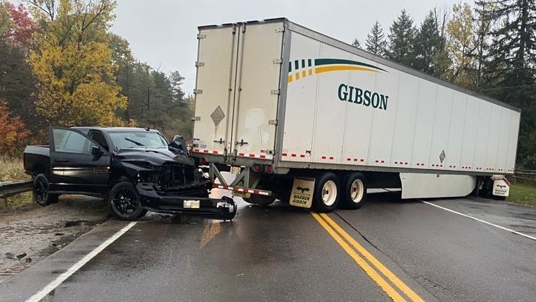 A collision between a pickup truck and transport truck caused Highway 9 in Mono Mills to be closed for several hours on Wed., Oct. 21, 2020. (OPP Central Region/Twitter)
