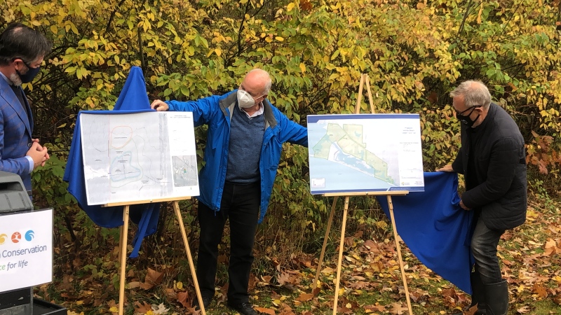 From left: Kieran McKenzie, Chair, Essex Region Conservation Authority, Claire Wales, Vice President, Essex Region Conservation Foundation, and Richard Peddie, President, Amherstburg Community Foundation, unveil the designs for the new wetland and cycling trail, for which the ACF has raised over $26,000. (courtesy ERCA)
