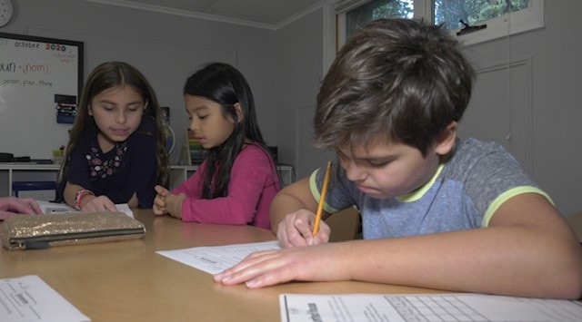 Students do their homework in The Etobicoke Learning Lab. (Beth Macdonell/CTV News Toronto)
