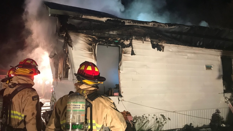 Ottawa firefighters battle a blaze at a home on Redfern Avenue in Bells Corners, Oct. 27, 2020. (Photo courtesy of Ottawa Fire Services)