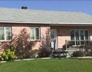 A man is dead after an attempted murder-suicide at this home on Gentilly Street in Gatineau, Sunday, Oct. 18, 2009.