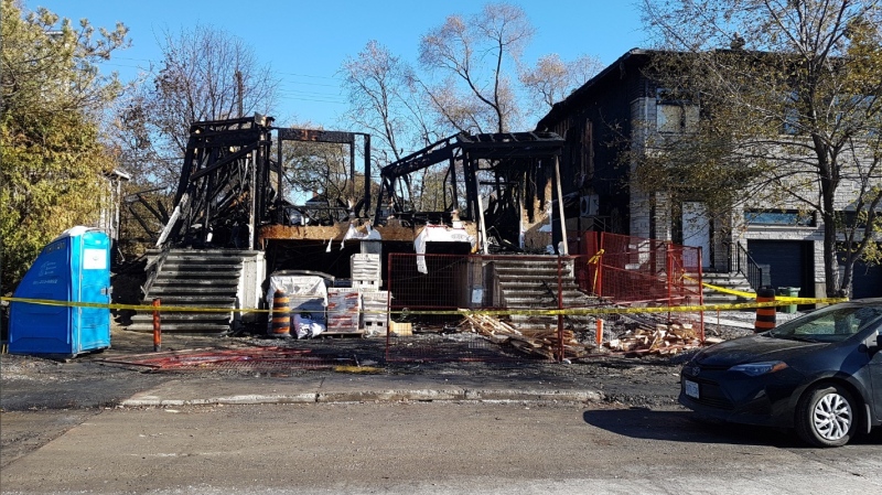 A fire started overnight in a home under construction on Longpré Street in Vanier on Oct. 31, 2020. Two other homes were damaged. (Michael Mersereau/CTV News Ottawa)