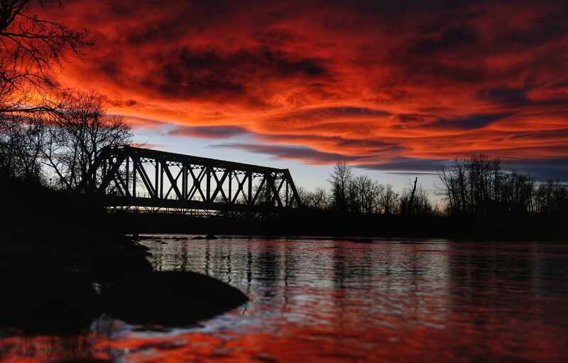 Chris's photo of the Nov. 2 sunset over the train bridge in Bowness