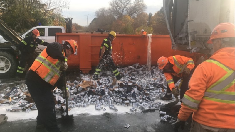Crews cleanup beer after a crash on Highway 3 in Windsor, Ont., on Thursday, Nov. 5, 2020. (Bob Bellacicco / CTV Windsor)