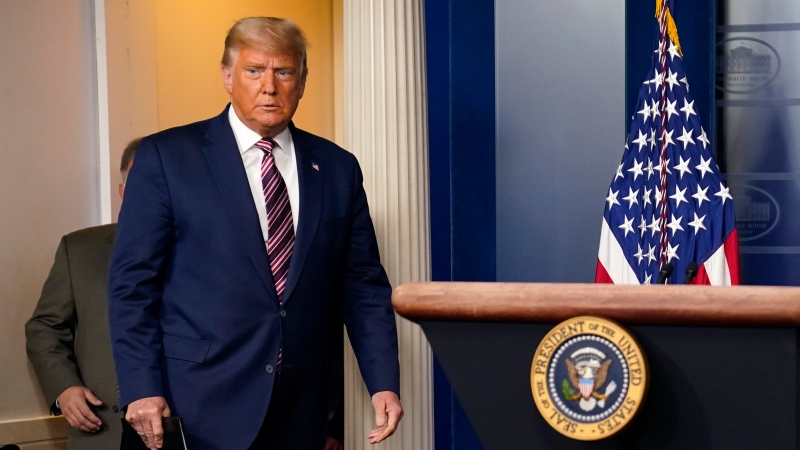 U.S. President Donald Trump arrives to speak at the White House, Thursday, Nov. 5, 2020, in Washington. (AP Photo/Evan Vucci)