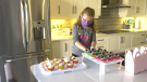 Sophie George, 8, making cupcakes. She's selling them to raise money for the Ottawa Hospital Foundation's COVID-19 Emergency Response Fund. (Shaun Vardon / CTV News Ottawa)