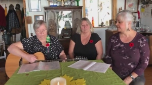 Women in Song trio from Blind River Patty Dunlop, Lois Jones and Debbie Rivard sing "A Song About War"