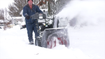 A man clears snow in Saskatoon on Nov. 10, 2020. (Pat McKay/CTV Saskatoon)