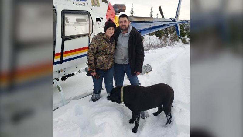 An RCMP helicopter picked up a very grateful Tamara Sandulak, Cody Martin and Rex, knee deep in snow at Moriarty Lake. (Nanaimo RCMP)