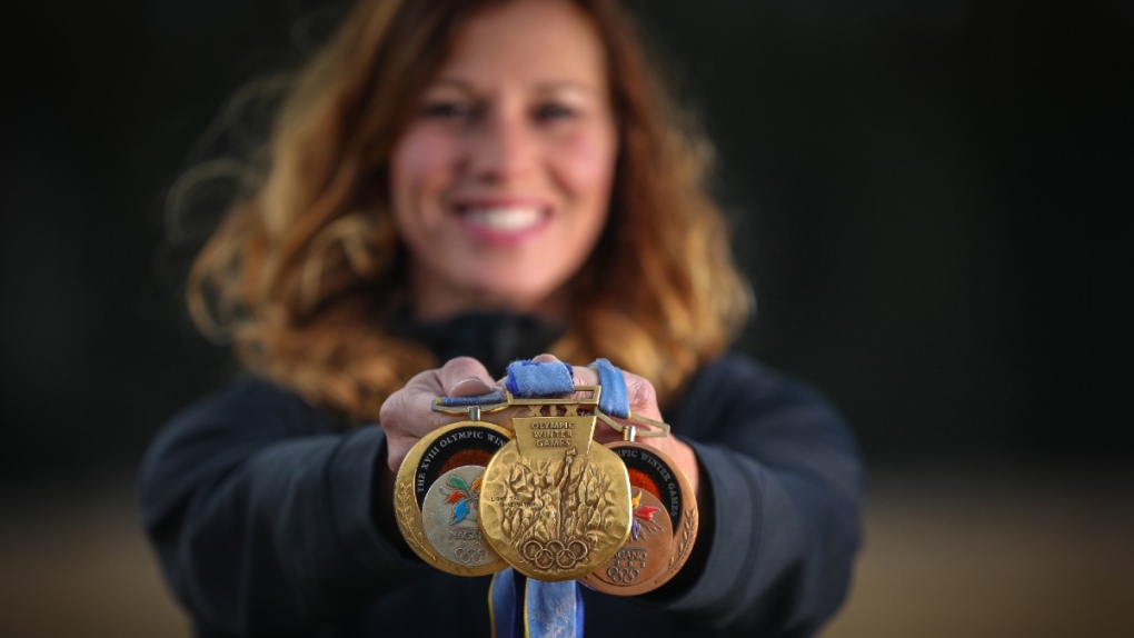 Catriona Le May Doan holds Olympic medals