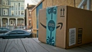 An Amazon package on a porch. (Robert Bumsted / AP)